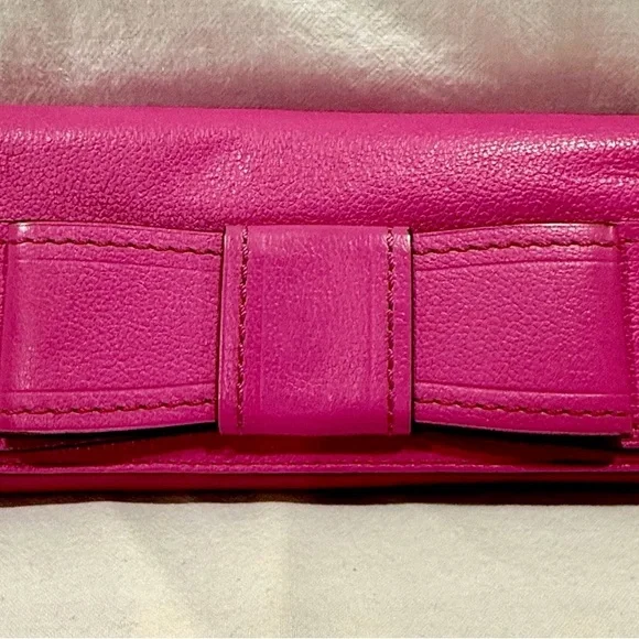 Kate Spade VGUC Bubblegum Pink
Leather VillabellaAve Mara Bow Wristlet
W/COA - Picture 3 of 12